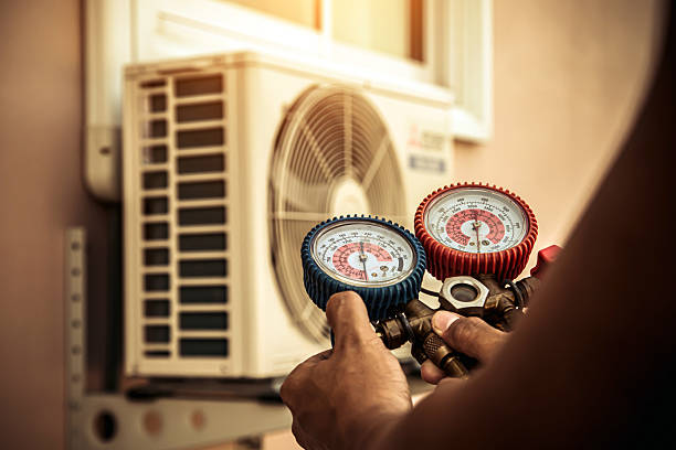 Professional Ductwork Repair technician working in Hudson, MA